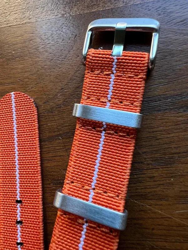 Bracelet NATO en nylon extensible orange avec liseré blanc - Vinty Watches