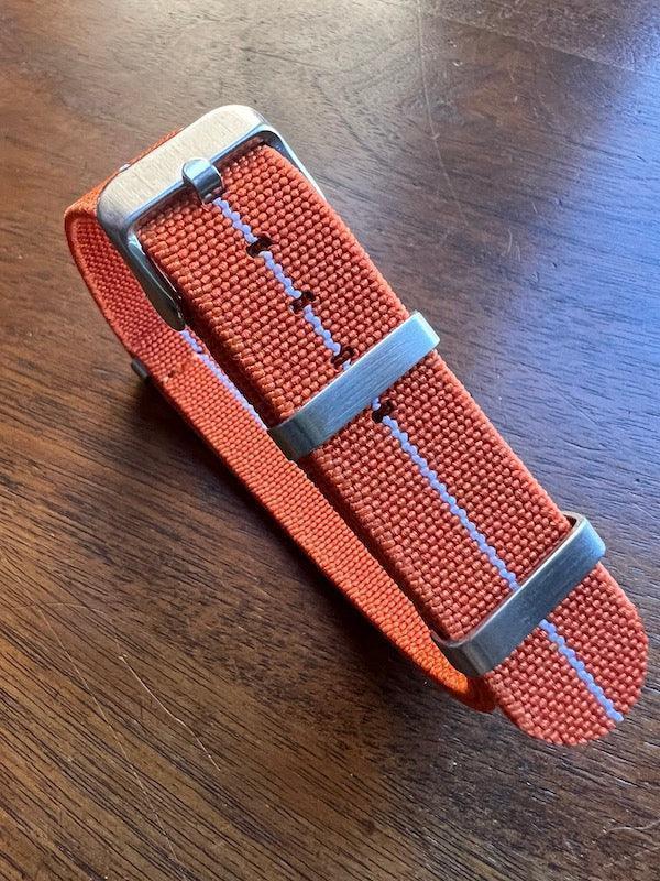Bracelet NATO en nylon extensible orange avec liseré blanc - Vinty Watches