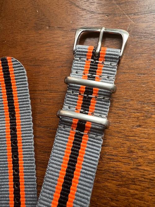 Bracelet NATO en nylon balistique orange, gris et noir